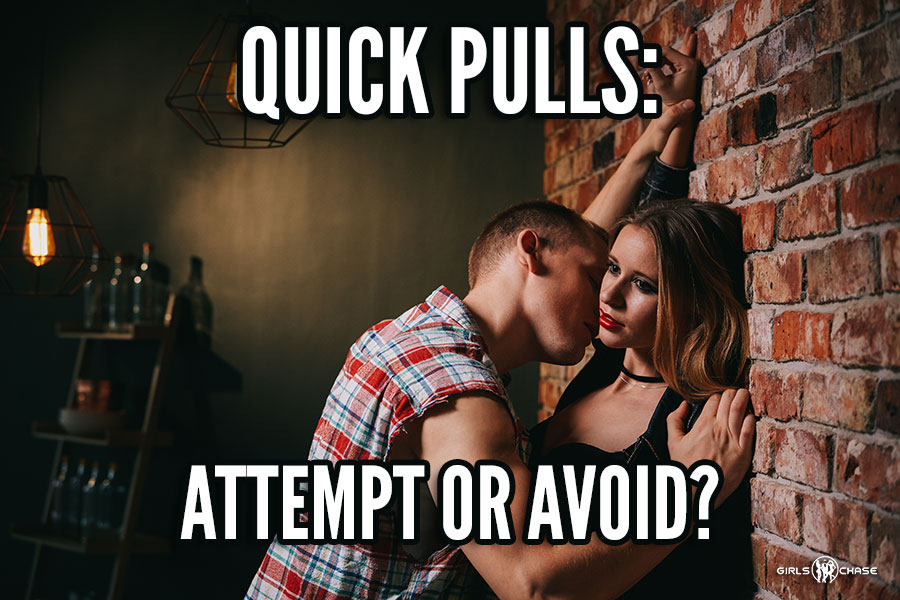man kissing woman against brick wall in bar